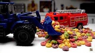 Miniature Rescue: RC Loader Saves Red Toy Sports Car from Landslide!