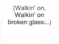 Annie Lennox - Walking on broken glass lyrics.