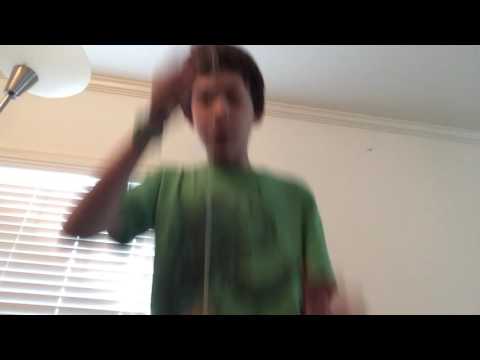 Kendama trick: Base cup to spike.