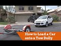 How to Load a Car on to a Tow Dolly