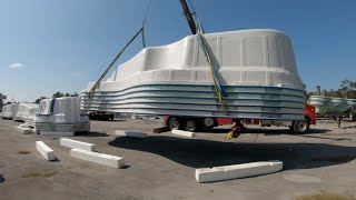 How to unload six 37' fiberglass pools at once.