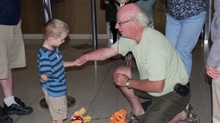 Adopted Boy with One Hand Bonds with New Grandpa Over Shared Condition
