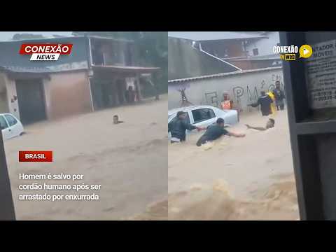 Vídeo: Homem é salvo por cordão humano após ser arrastado por enxurrada.