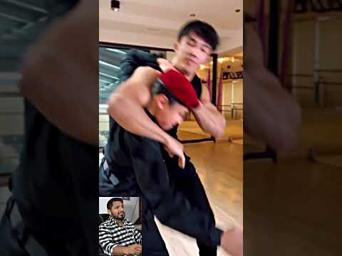 A female soldier teaches how to defend yourself against a man.