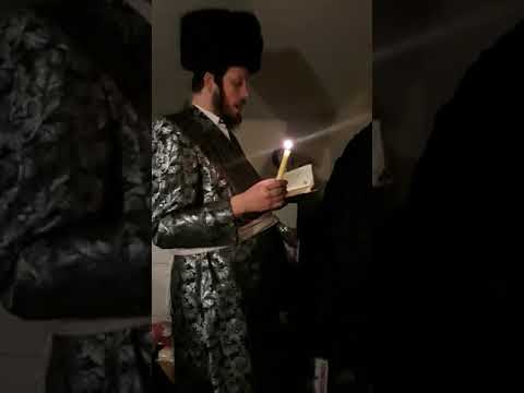Koblentzer Rebbe lighting the menorah on Zos Chanukkah