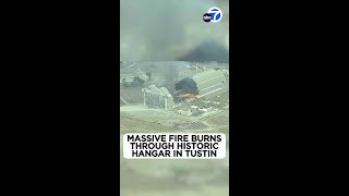 Massive fire burns through historic hangar in Tustin