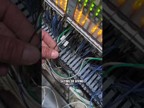 The Everyday Electricians hunts for three wires in this PLC cabinet