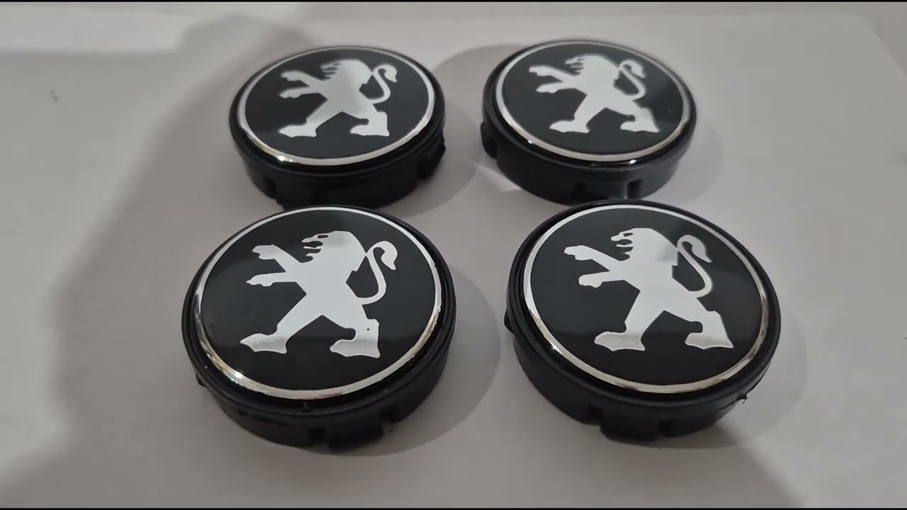 Peugeot Coprimozzi 58/56 mm (set da 4) Video 1