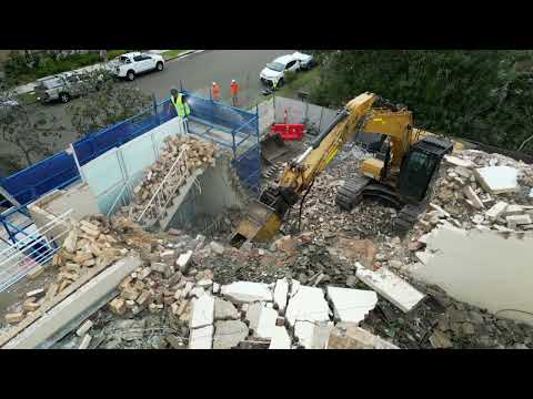 Pulveriser Working on Residential Building Demolition