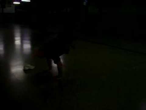 Backward sommersault to handstand