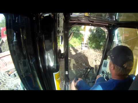 Loading dump truck with the new Cat 311