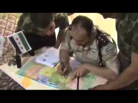 مقابلة تلفزيونية مع النقيب عمار الواوي حول سير حياة مقاتلي الجيش الحر وآلية الدعم الذي يحصلون عليه