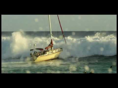 Point Panic! Big Wave hits sailboat at Ala Moana Bowls in Waikiki