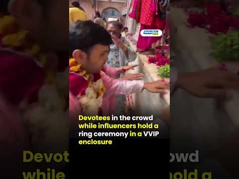 Devotees in the crowd while influencers hold a ring ceremony in a VVIP enclosure