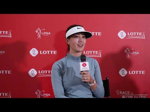 Golfer Michelle Wie reacts to Tiger Woods' win at the Masters