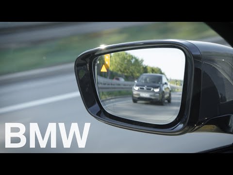 Part of a video titled How to change the settings for Lane Change Warning – BMW How-To