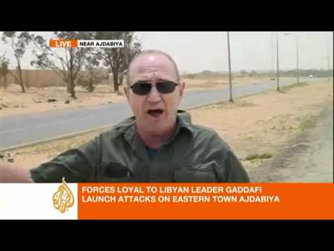 Gaddafi troops outflank rebels