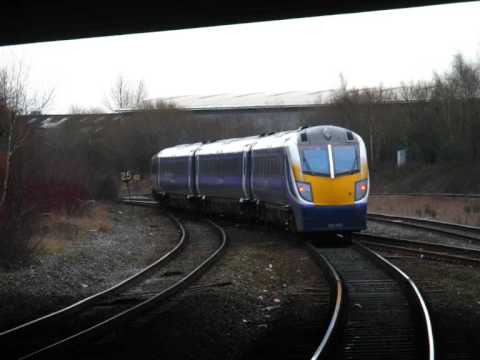 Northern 180103 departs Salford Cresent (11/02/2009)