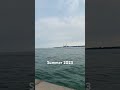 Sheboygan, WI has a big red lighthouse with long pier - Summer 2023