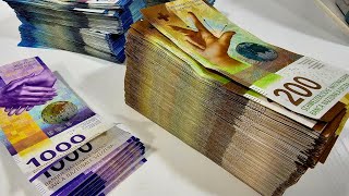 Counting 150,000 Swiss Francs