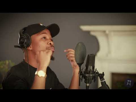 THATO SAUL ON THE WOODEN STOOL