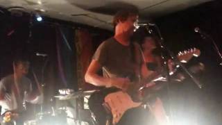 pansy division- fem in a black leather jacket