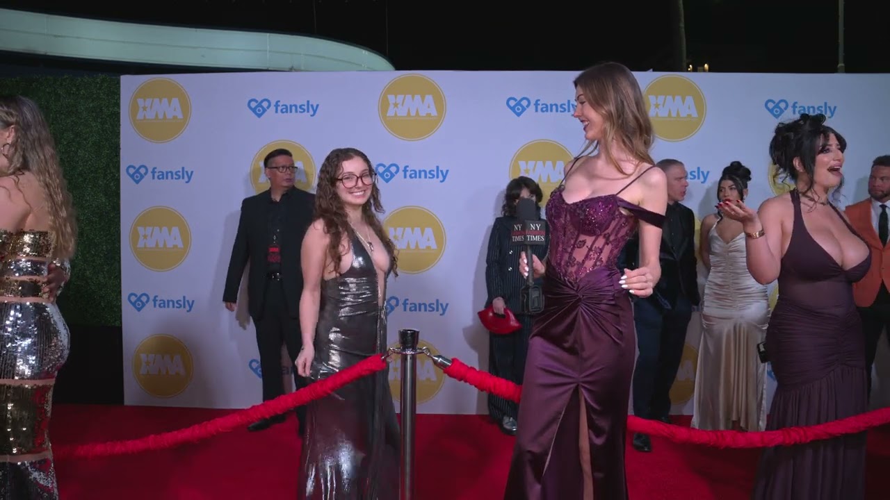 Ellie James interviews and poses with Leanna at XMAAwardsLA on the red carpet