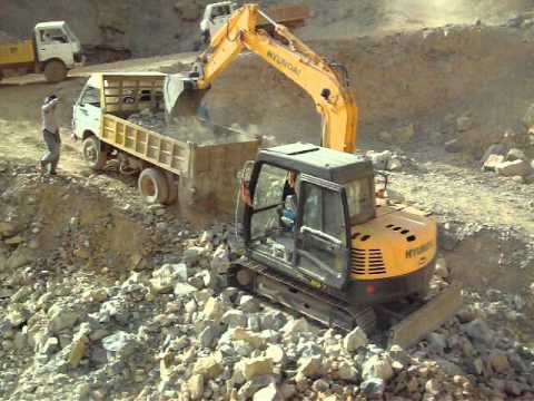 Hyundai excavator working on a field