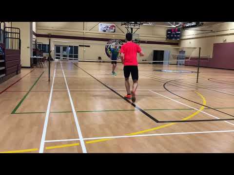 Houle twins playing badminton vs one another set 1