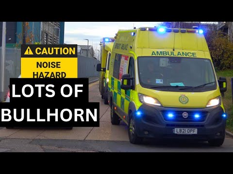 *LOTS OF BULLHORN*  TWO AMBULANCES RESPONDING ON BLUE LIGHTS AND SIRENS
