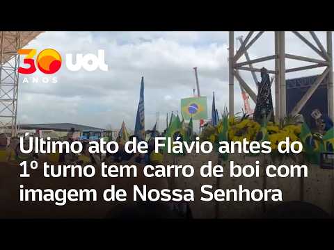 Apoiadores levam imagem de Nossa Senhora em última agenda de Flávio Bolsonaro