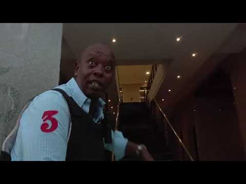 Associated Press video from inside a Nairobi hotel during an extremist attack shows Kenyan security officers anxiously searching the building and scared workers emerging from hiding places while gunfire is heard. (Jan. 15)