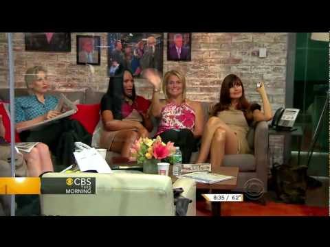 Carol Alt - quick leg show in very short skirt