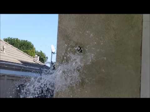Slow Motion: Water Balloon Hitting Wall.mp4