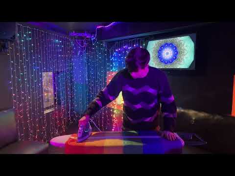 Ironing the Pride Flag at The Duplex