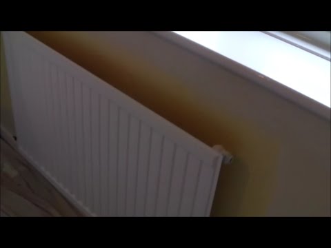 How to paint and roll behind a radiator