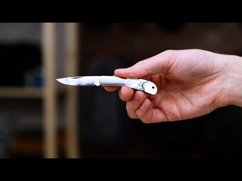 Moki Meek Arrow Polished AUS-8 Bolstered Mother of Pearl Lock Back