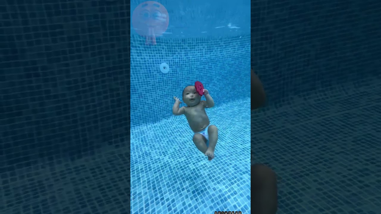 Cute Baby swimming in pool 🌞