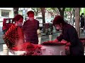 Beijing locals keep dining on duck despite COVID - Video