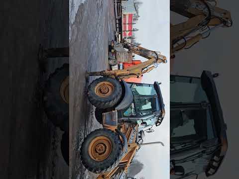 Case 695SR2-4PS, excavator loader