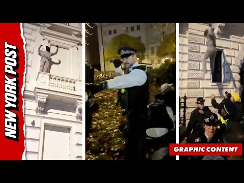 Protestor Scales London Embassy, Removes Iran Flag, Then Falls on Top of Police Causing Huge Brawl