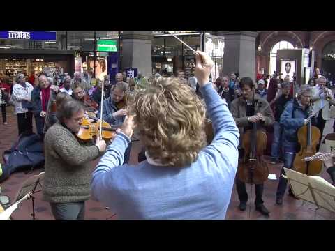 Flash mob at Copenhagen Central Station. Copenhagen Phil playing Ravel's Bolero.