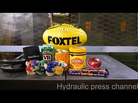 Crushing huge pile of Australian stuff with hydraulic press