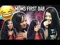 MEXICAN MOM TAKES HER FIRST DAB
