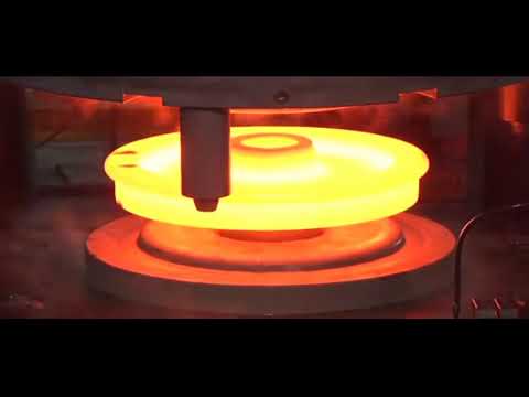 Amazing train wheel production process with an automated forging line.