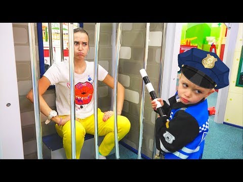 Vlad and mama play at the game center for children