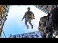US Marines Paratroopers Jump from KC-130 Hercules and UH-1N Huey