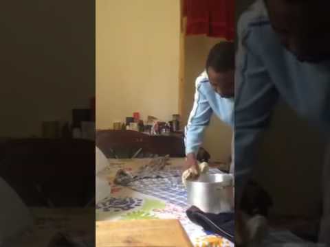 Stupidity to its highest, man using hot water pot to iron his shirt