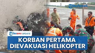 Detik-detik Korban Pertama Pesawat ATR 42-500 Dievakuasi Helikopter di Lampeso untuk Diidentifikasi