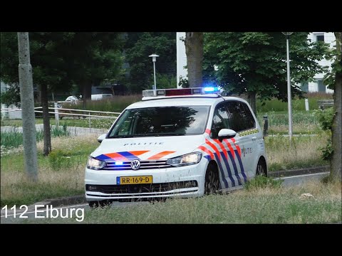 P1 Politie Touran 2018 met spoed door Enschede naar een onbekende melding